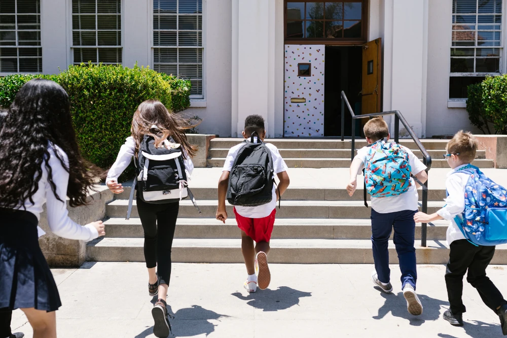 Students walking into their school building